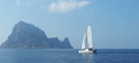 Catamaran sailing by the South East of Ibiza island