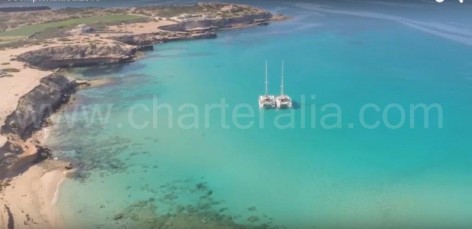 Catamarans of charteralia at Cala Conta