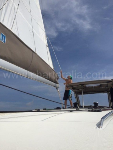 Main sail of the catamaran Lagoon 400 that is rented for ship excursion in Ibiza