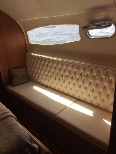 Cabin sofa onboard Cat 21 boat hires in Ibiza
