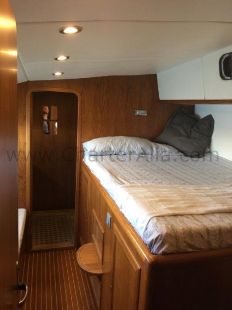 Double bed on board Cat 210 Ibiza catamaran hire