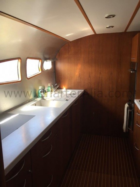 Kitchen aboard Cat 210 yacht in Balearic Islands for excursions
