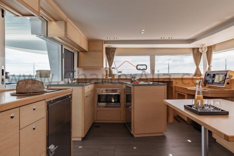 U shaped kitchen aboard 450 SportTop Lagoon boat hire in Ibiza