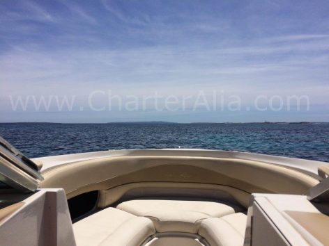 Cushioned seats on board Sea Ray 230 speed boat for hire with skipper in Ibiza