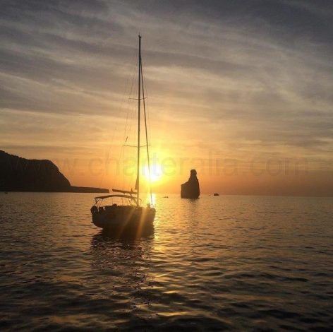 Charteralia sailing boat watching sunset in Cala Benirras