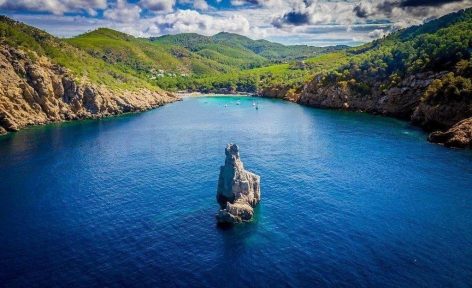 Drone view from sea of Cala Benirras