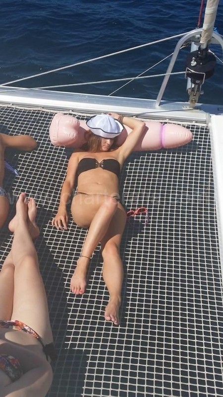 taking a nap on a boat from ibiza to formentera
