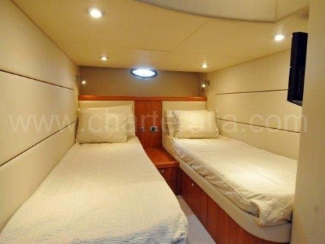 Twin beds on board of the Portofino 46 Sunseeker