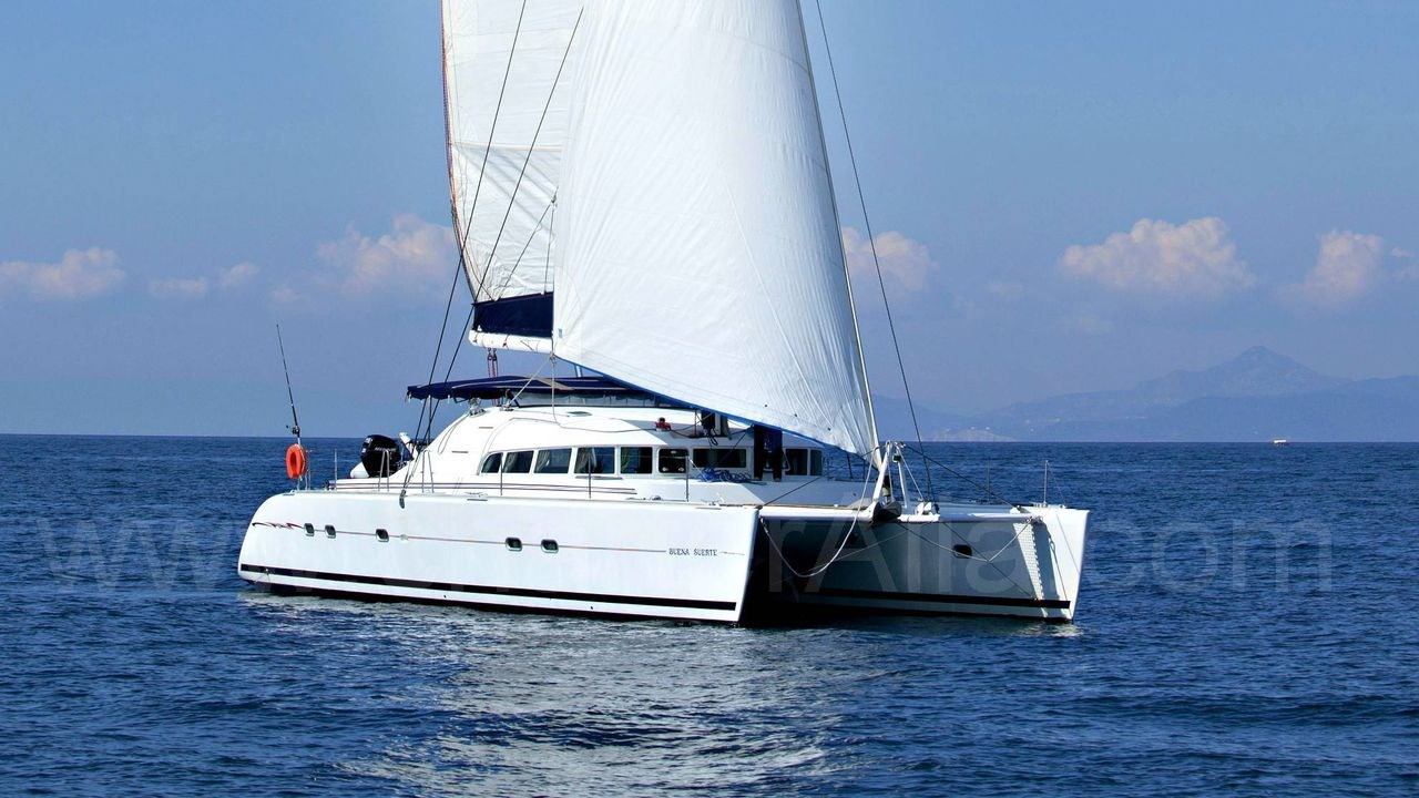 Lateral view of the Lagoon 470 catamaran available for renting in the Balearic Islands