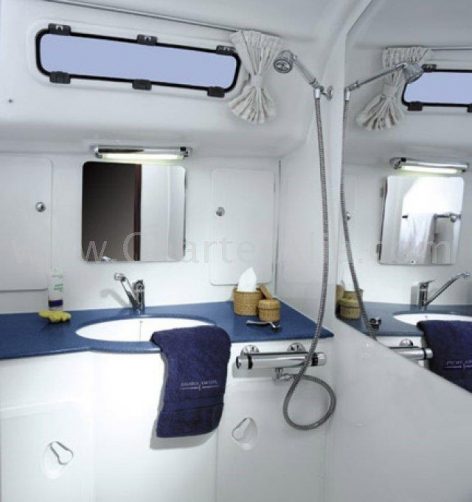 Bathroom with shower inside the catamaran for hire in Ibiza CharterAlia Lagoon 380 20018