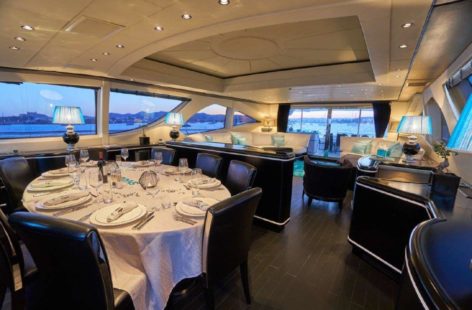 dining table inside the Mangusta super yacht 130 feet